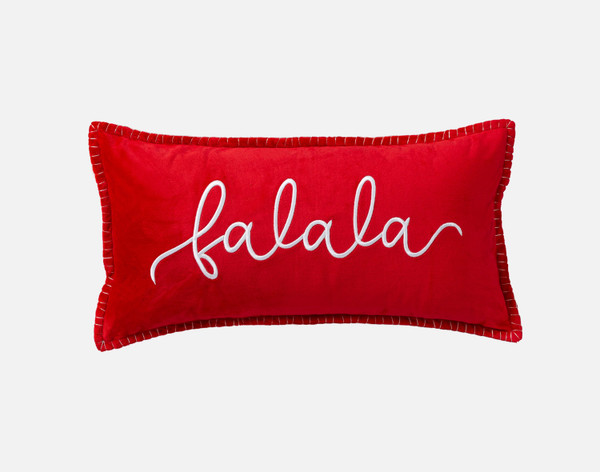 Our Fa La La Holiday Cushion sitting against a solid white background.