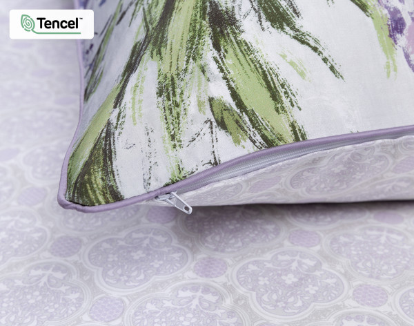 Close-up on the light lavender piped border on the corner of our Prose Pillow Sham.