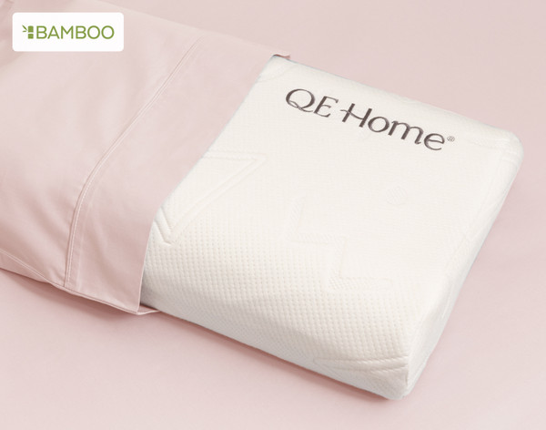 Top view of our Small Bamboo Cotton Pillowcase in Blush Pink to show a Petite Adjustable Memory Foam Pillow fitting inside.