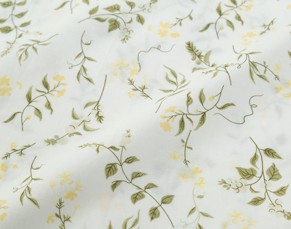 Close-up on the comfortable cotton fabric on our Cotton Percale Sheet Set in Vanora. 