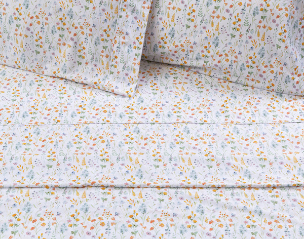 Flower Field Organic Cotton Sheet Set close-up to see flat sheet and pillowcases.