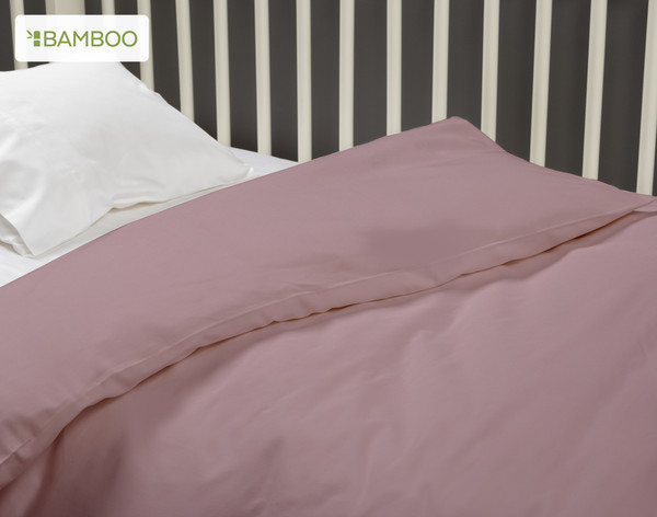 Close-up on our Bamboo Cotton Crib-Sized Duvet Cover in Orchid Pink to show its cozy softness.