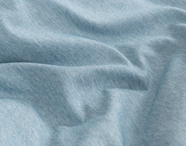 Ruffled fabric on our Heathered Jacquard Comforter Set in Steel Blue to show its soft surface.