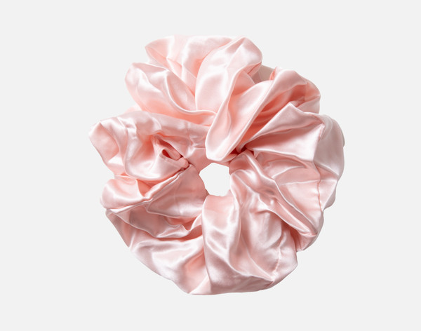 Top view of our Mulberry Silk Oversized Scrunchie in Blush sitting against a solid white background.