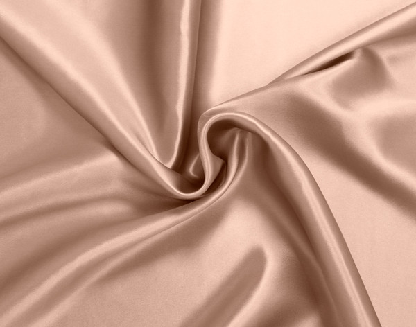 Furled up fabric on our Mulberry Silk Pillowcase in Frosted Berry to show its luxuriously smooth surface.