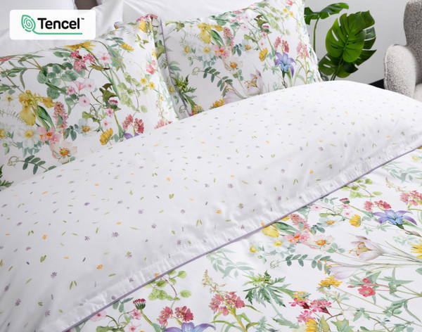 Folded top edge of our Bloomfield Duvet Cover to show its surface and reverse patterns side-by-side.