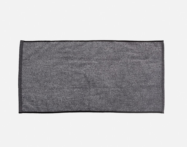 Top view of our Charcoal Infused Cotton Hand Towel resting flat on a solid white background.