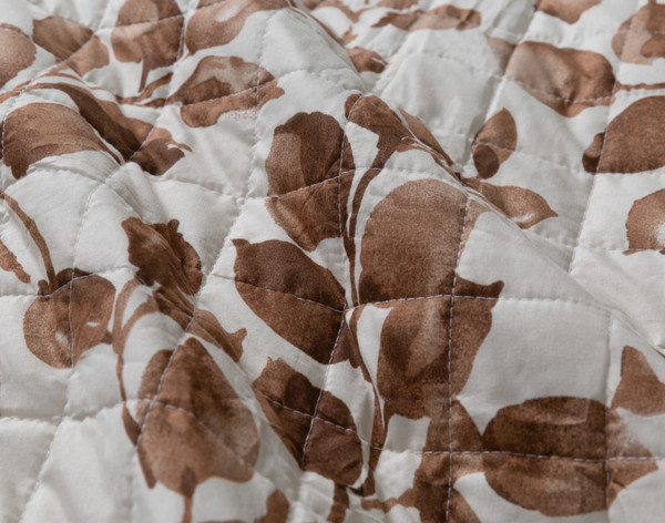 Close-up on the surface design on our Selva Coverlet Set.