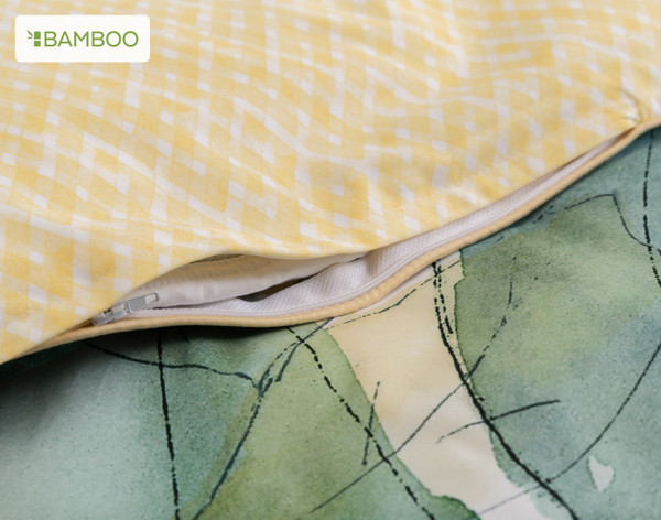 Close-up on the zipper enclosure and yellow piped border on our Tilbury Duvet Cover.