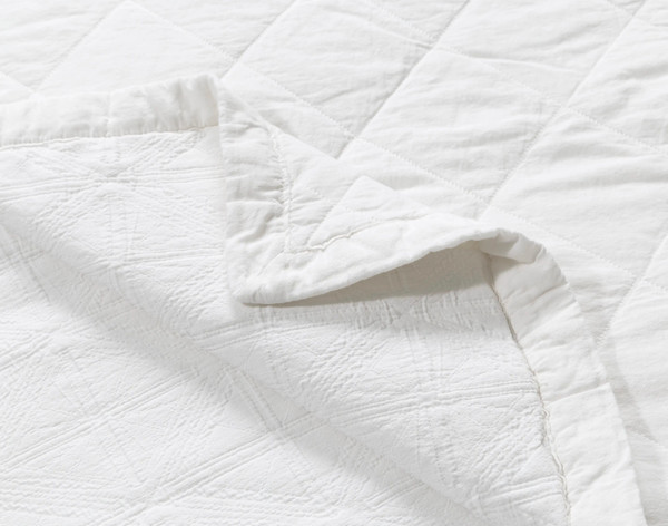 Folded corner on our Shelby Quilt Set to show its indulgent cotton softness.
