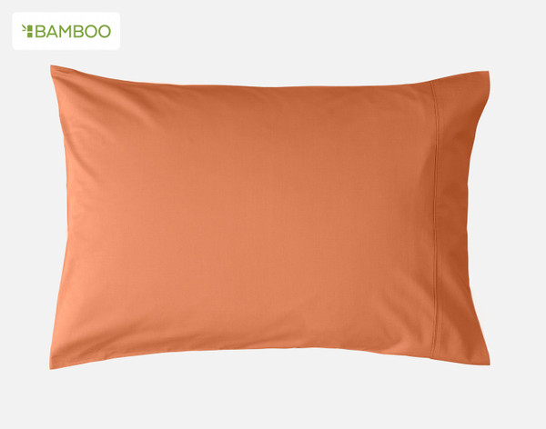 Front view of one of our Bamboo Cotton Pillowcase in Apricot sitting against a solid white background.