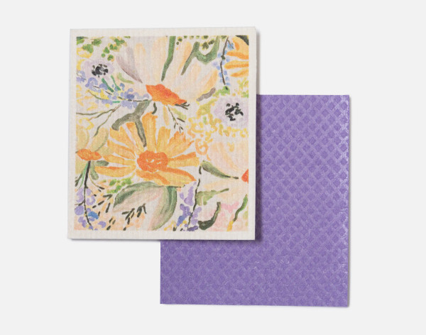 Front view of our Wildflower Swedish Dishcloth Set, featuring a both a patterned and solid purple hand-sized reusable cloth.