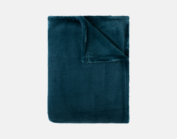Our Velvet Plush Throw in Bluewater folded neatly into a tidy square.