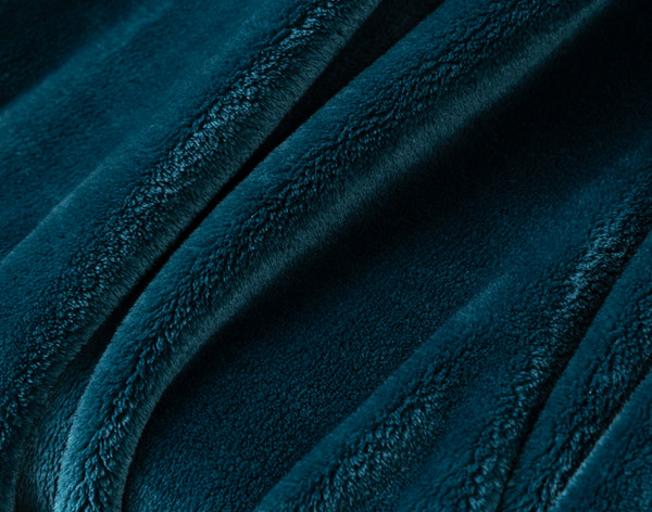 Close-up on our Velvet Plush Throw in Bluewater to show its soft velveteen texture.