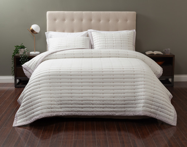 Front view of our Madison Coverlet Set dressed over a queen bed in a contemporary bedroom.