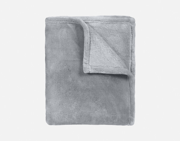 Our Cashmere Touch Fleece Blanket in Slate Blue folded in a tidy square.