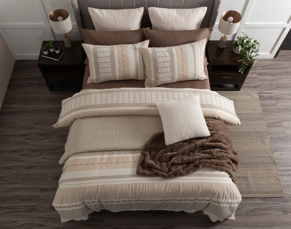 Top view of our Adrift collection dressing a queen bed in a simple bedroom.