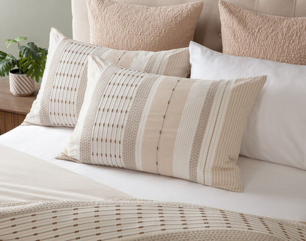Our Adrift Pillow Shams dressing the head of a bed with our Adrift Duvet Cover and matching accessories.