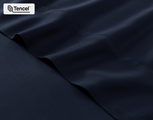 Close-up on the fitted and flat sheet of our BeechBliss TENCEL™ Modal Sheet Set in Deep Space.