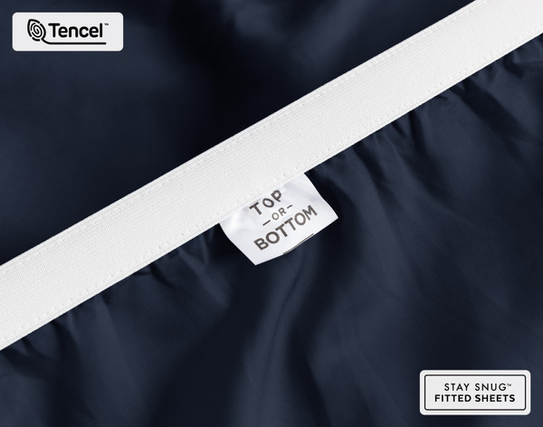 Close-up of Top & Bottom tag on the elastic of our BeechBliss TENCEL™ Modal Fitted Sheet in Deep Space.