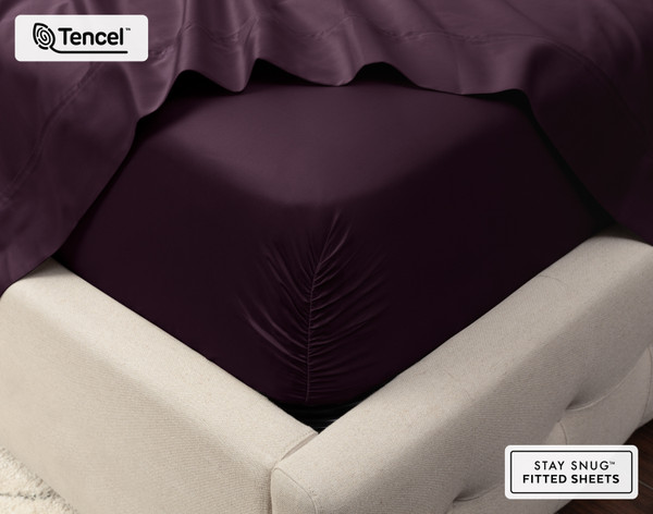 Close-up on the corner of a mattress with our Eucalyptus Luxe TENCEL™ Lyocell Fitted Sheet in Purple to show its snug fit.