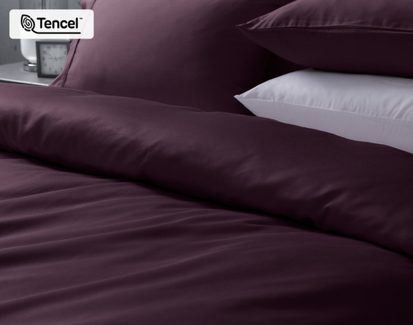Angled view of our Eucalyptus Luxe Duvet Cover in Purple.