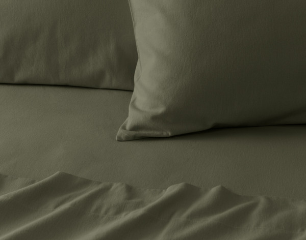 Close-up on the corner of a pillowcase from our Pinetree Flannel Sheet Set.