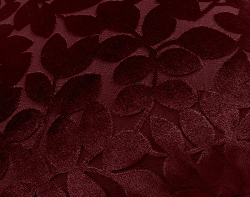 Close up of Velvet Vine Square Cushion in Garnet, a dark red.