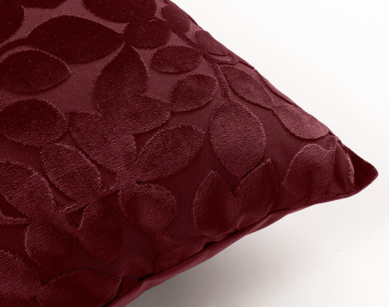 Close up of Velvet Vine Square Cushion in Garnet, a dark red.