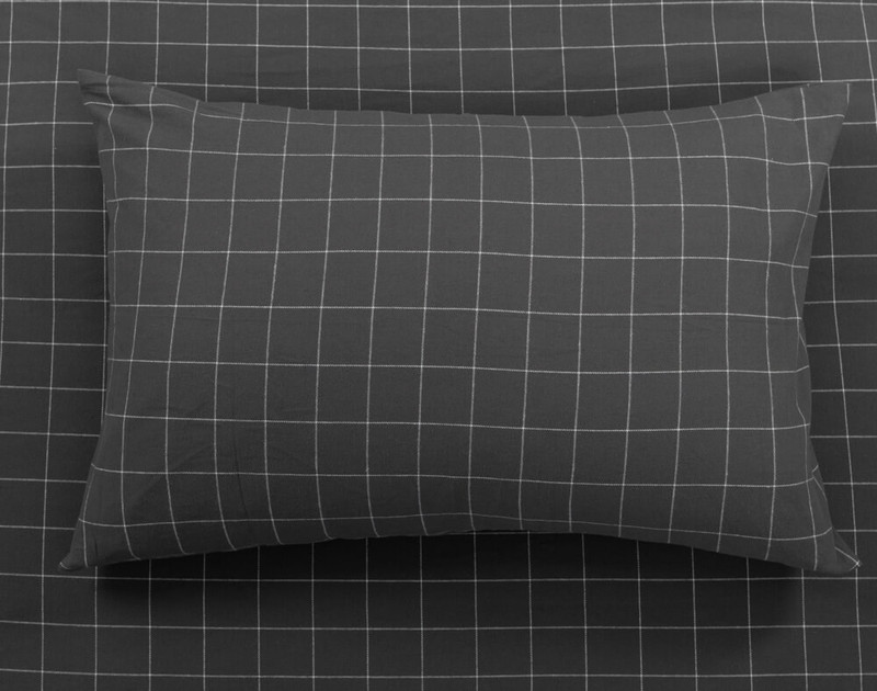 The Black Flannel Pillow Sham of our Alistair Black Flannel Duvet Cover Set.