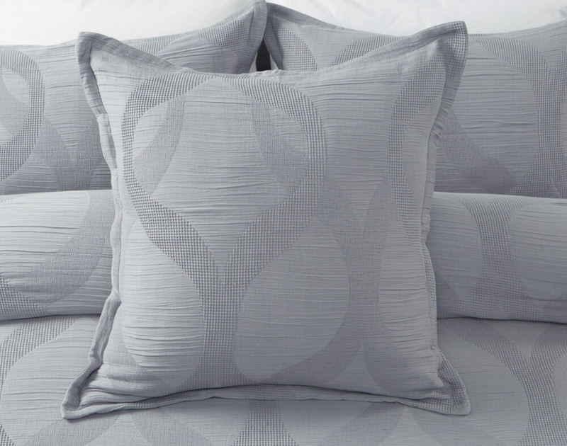 Close-up of our Verity Euro Sham sitting on a Verity Duvet Cover.
