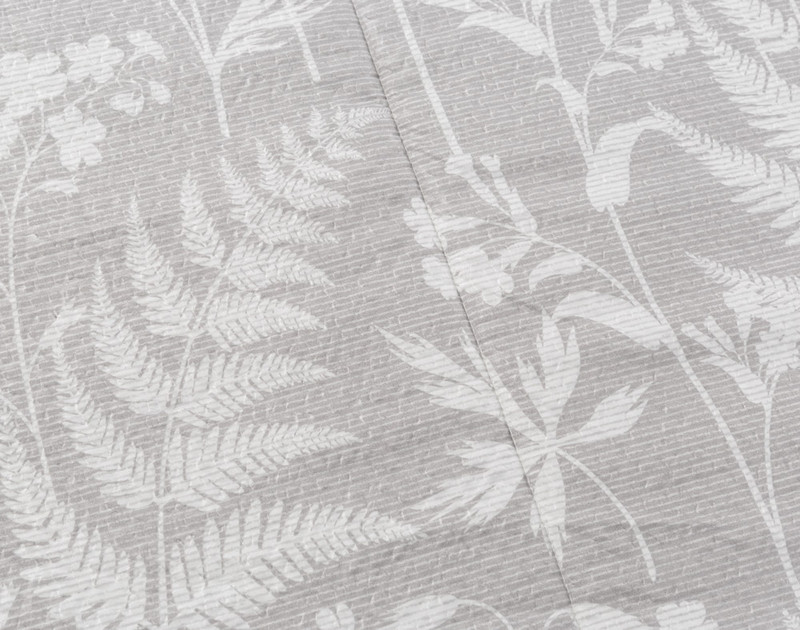 Close-up on the botanical leafy  pattern on our Maidenfern Recycled Comforter Set.