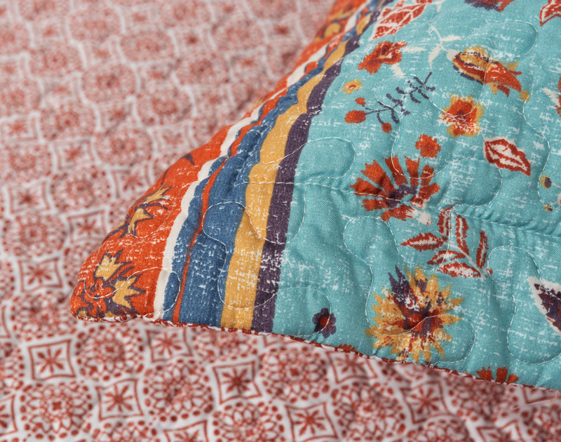 Close-up on the flange edge corner on the pillow sham for our Ferrah Coverlet Set.