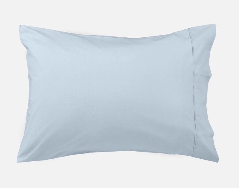 Front view of the pillowcase for our Cotton Percale Sheet Set in Blue sitting against a blank background.