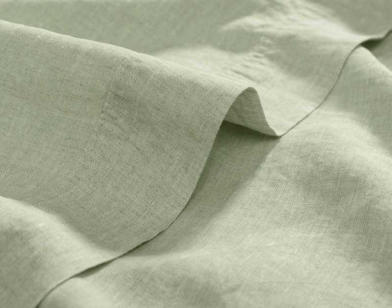 Vintage Washed European Linen Flat Sheet in Sagebrush Green, close-up view.
