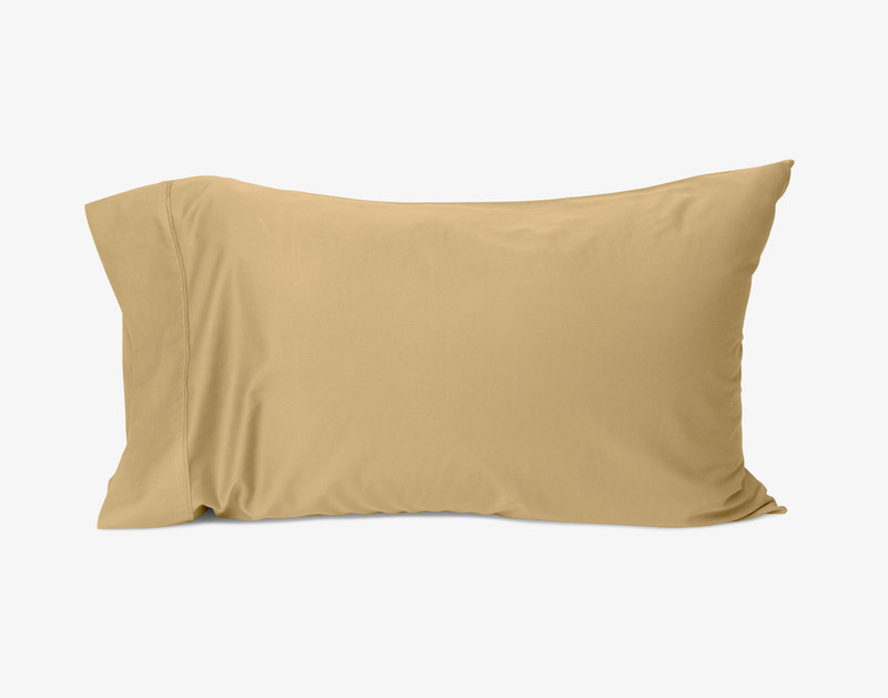 Our Bamboo Cotton Pillowcase in Barley against a white background.