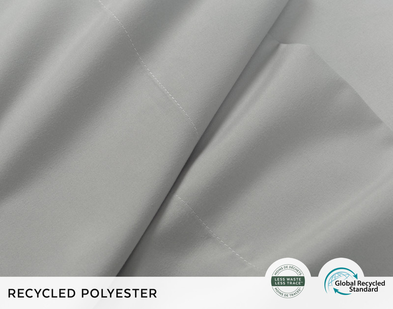 Close-up of scrunched up fabric on our Recycled Microfiber Sheet Set in Smoke to show its smooth and soft texture.