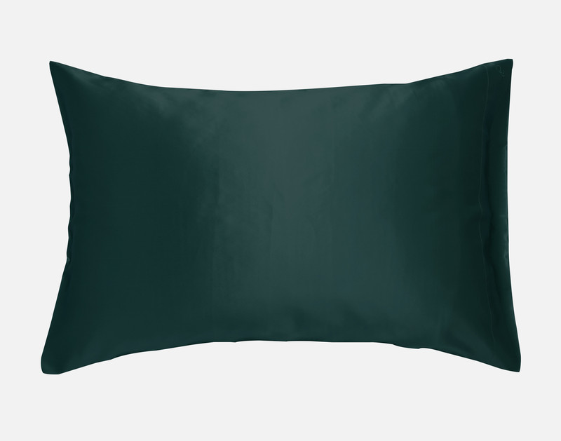 Our Mulberry Silk Pillowcase in Deep Teal sitting against a solid white background.