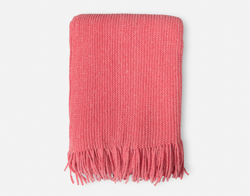 Our Chenille Throw in Fuschia folded into a tidy square to show its fringed edges.