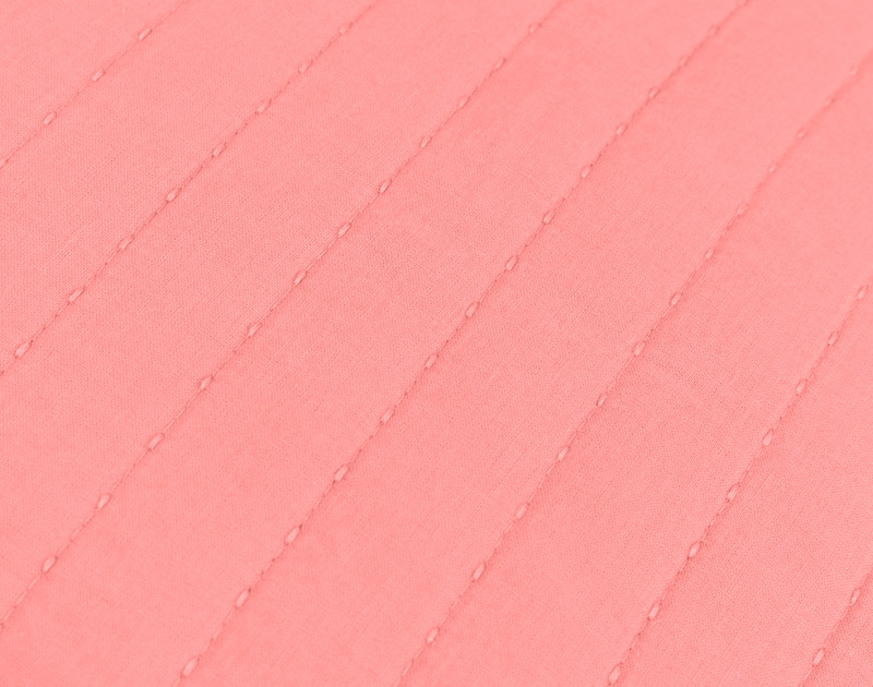 Close-up on the textural quilted lines on our Linen Cotton Euro Sham in Fuchsia.