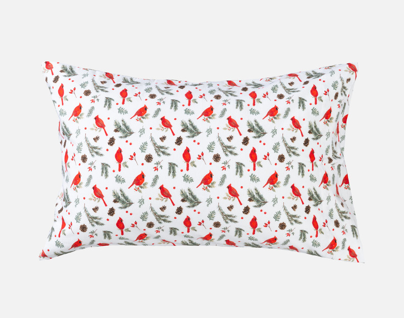Front view of the coordinating pillowcase for our Organic Flannel Cotton Sheet Set in Holly Jolly with matching red cardinal design.