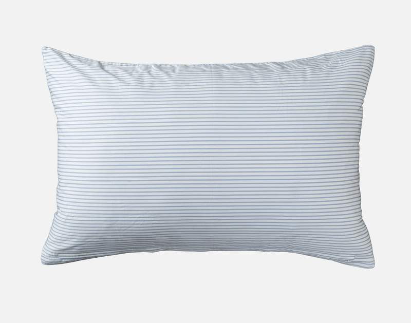 Striped blue reverse on our Whim Pillow Sham resting against a solid white background.