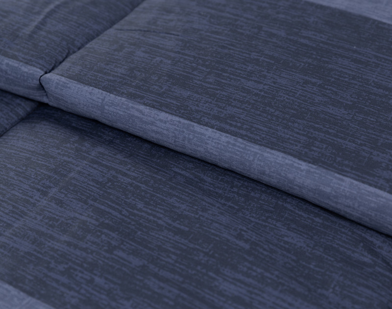 Close-up of our Knowlton Cotton Comforter Set to show its navy blue striped pattern.