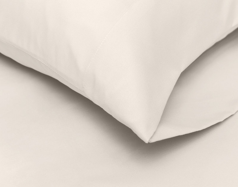 Close-up on corner of the pillowcase on our Recycled Microfiber Sheet Set in Mushroom to show its envelope enclosure.