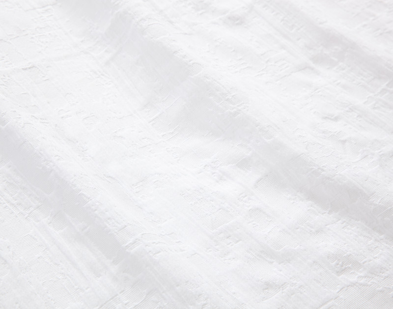 Close-up on the stone-like texture on the surface of our Chalkstone Duvet Cover.