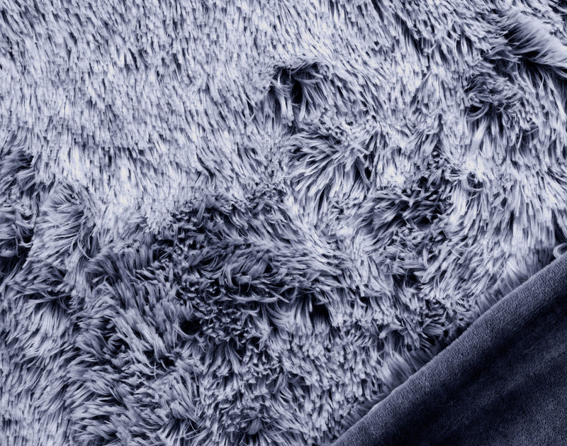 Close-up on the frosty tipped surface and solid reverse on our Frosted Shaggy Throw in Midnight.