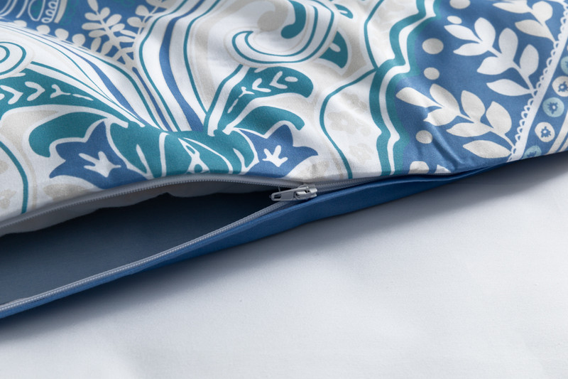 Close-up on the zipper enclosure on the side of our Giselle Duvet Cover Set.