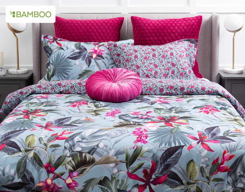 Front view of our Sulani Duvet Cover dressed over a queen bed with minimal accessories to show off its floral designs.