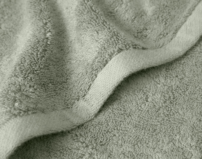 Close-up on the solid edge of our Modal Cotton Towels in Jadeite.