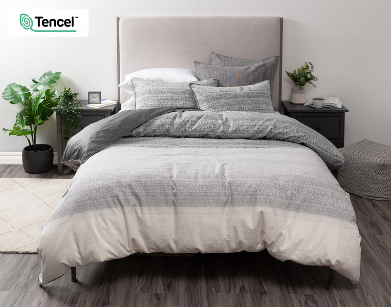 Front view of our Porter Duvet Cover to show its shifting grey, silver, and off-white tones.